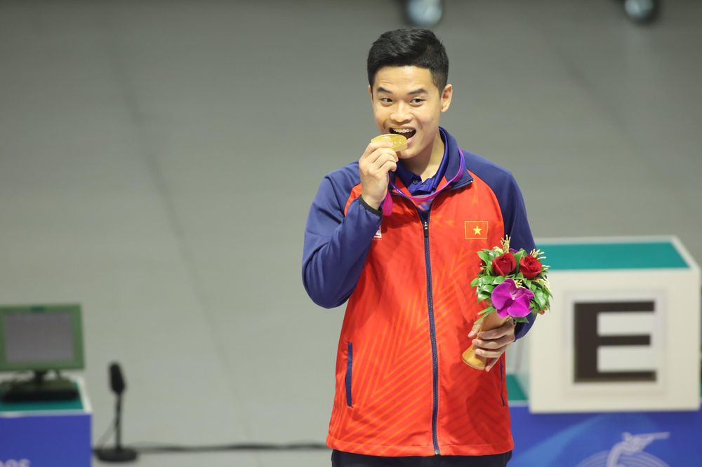 Thầy trò xạ thủ Phạm Quang Huy giành huy chương vàng ASIAD 19 được thưởng 335 triệu dồng - Ảnh 2.