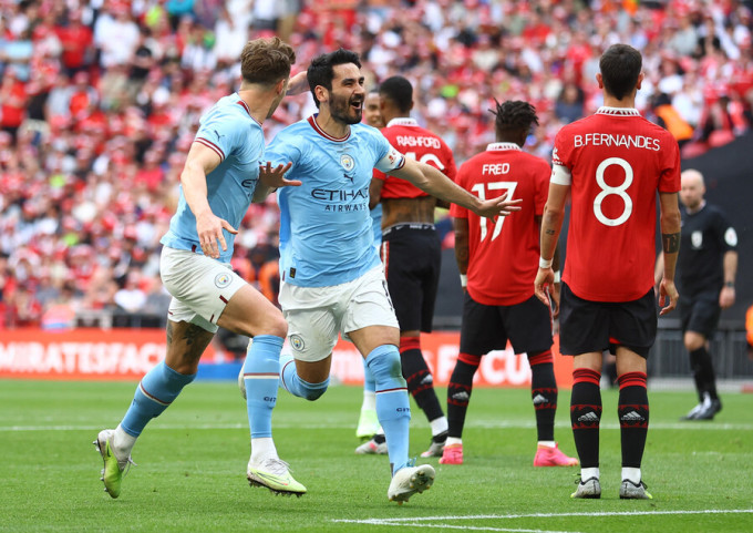 Gundogan celebrates scoring in the FA Cup final on June 3. Photo: Reuters