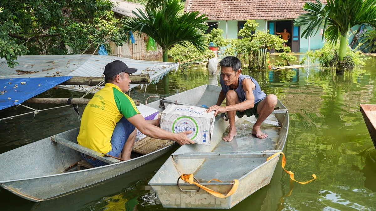 Une « inondation forestière » submerge des centaines de maisons dans la banlieue de Hanoi, photo 6