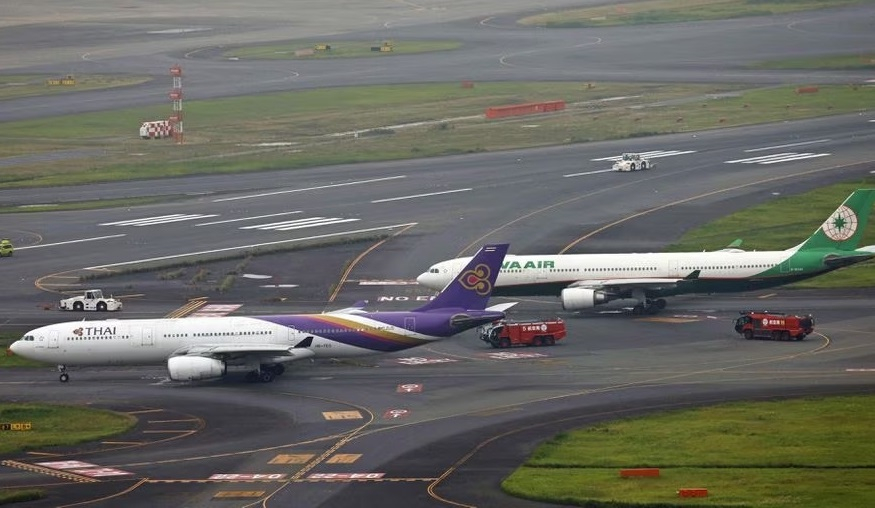 東京の滑走路で飛行機2機が衝突、死傷者なし 写真1