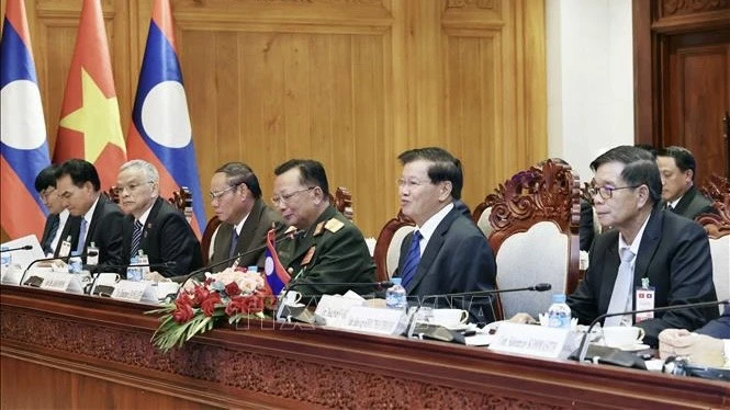 [Foto] El presidente To Lam se reúne con el secretario general y presidente de Laos, Thongloun Sisoulith. Foto 3