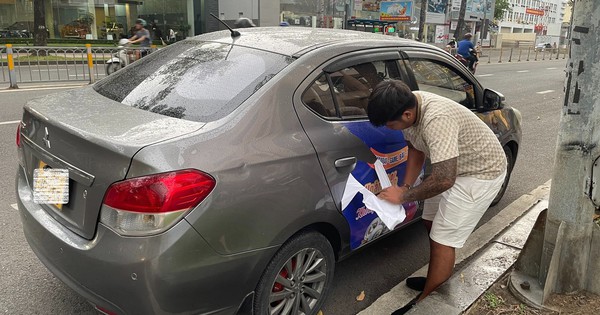 Verkehrspolizei von Ho-Chi-Minh-Stadt bestraft Autos mit Werbung für Glücksspiele und Kredite