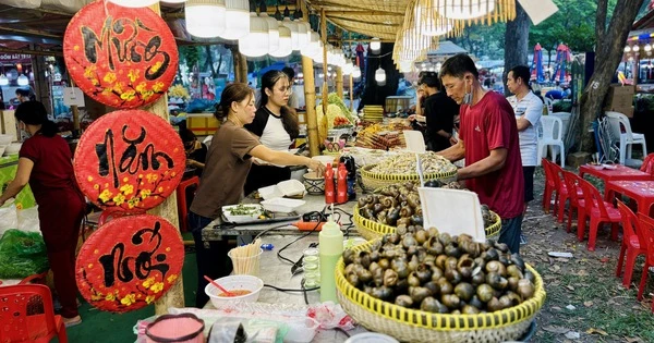 Un « paradis » de plats délicieux attire les visiteurs à Hô-Chi-Minh-Ville pendant le festival du Têt vietnamien