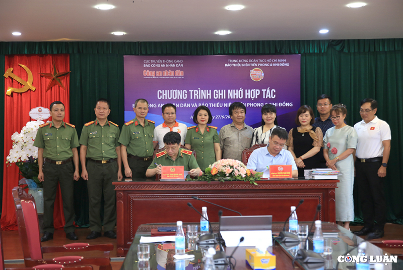 bao cong an nhan dan va bao thieu nien tien phong va nhi dong ky ket chuong trinh hop tac hinh 1