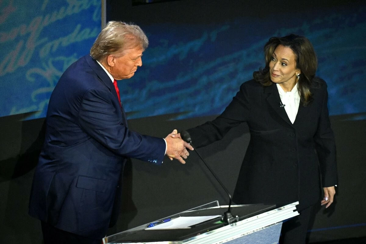 Former President Donald Trump and Vice President Kamala Harris shake hands before the start of the debate in Philadelphia, September 10. (Source: Getty Images)