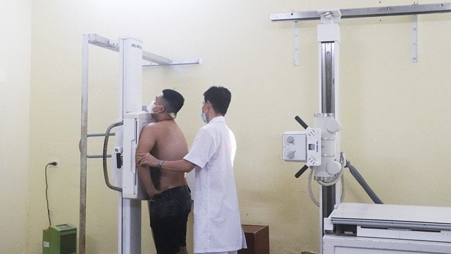 Does Hanoi have a policy to support students from other provinces with health insurance premiums?