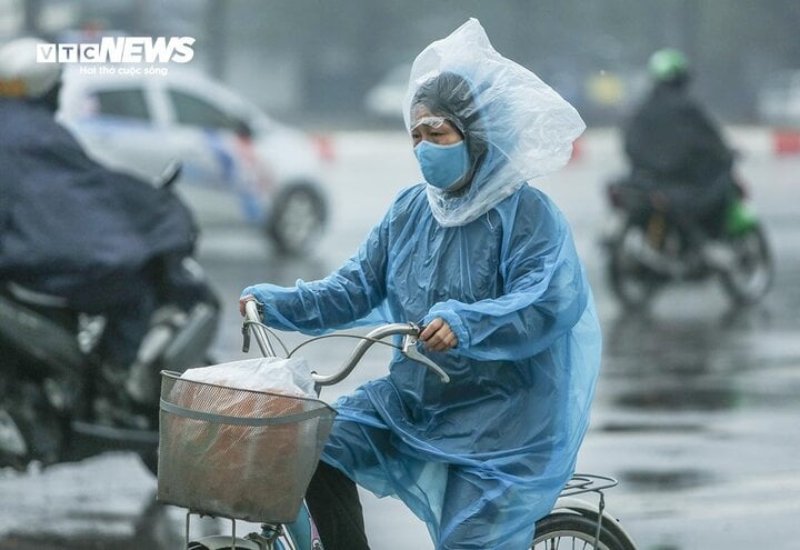 Le Nord est sur le point de devenir froid et pluvieux après avoir reçu une masse d'air froid qui se renforce. (Illustration : Ngo Nhung)