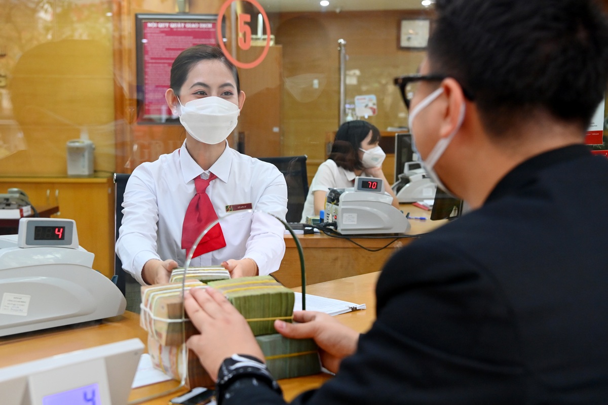 Tài chính - Ngân hàng - Lãi suất giảm, doanh nghiệp vẫn khó vay vốn: Thống đốc nói gì? (Hình 2).