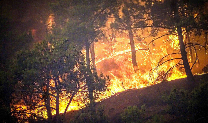 Wildfires on the Greek island of Rhodes, photographed in July. Photo: AP