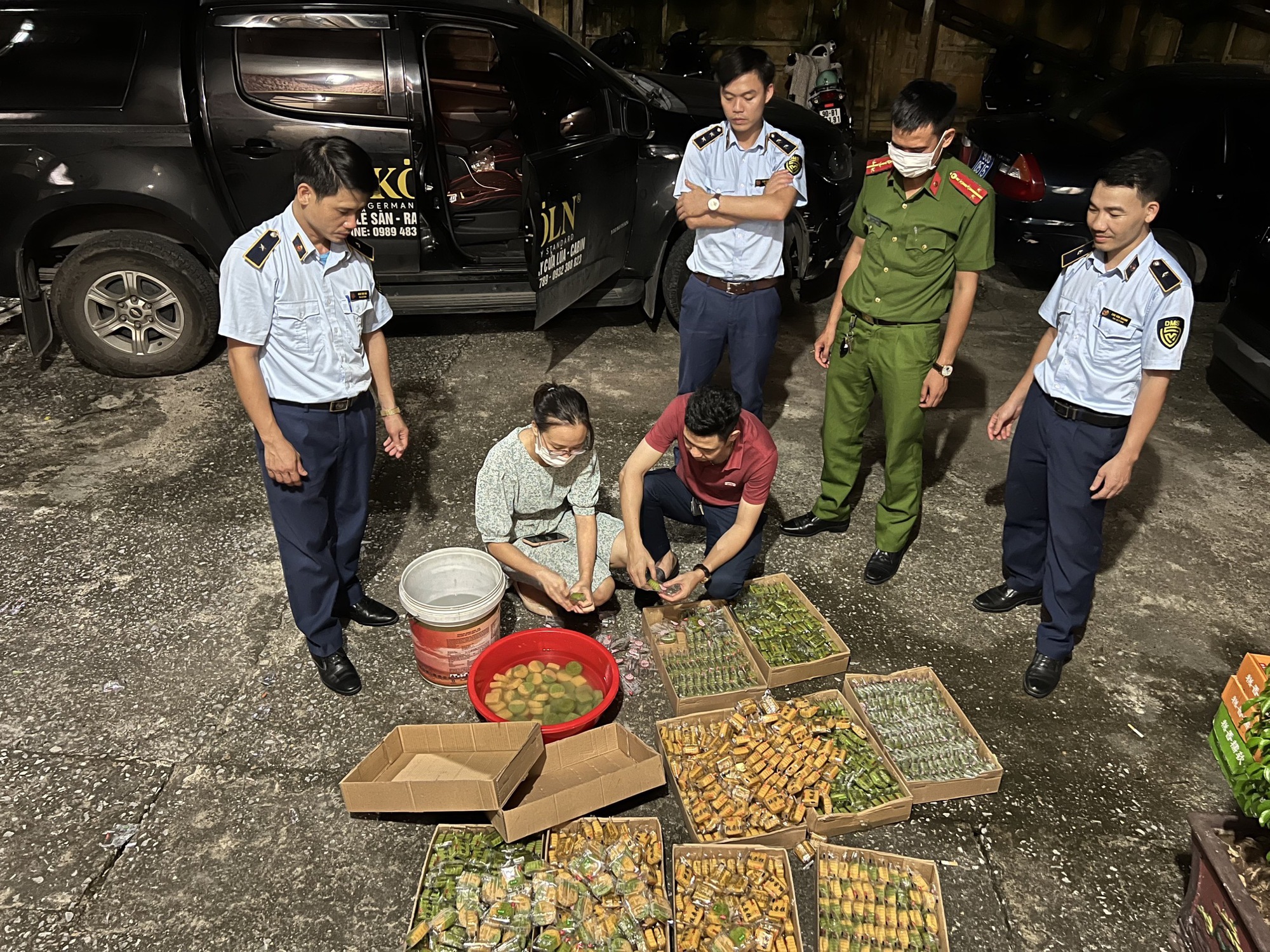 Authorities inspect a moon cake production facility.