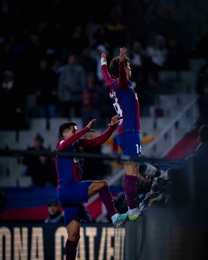 Felix jumped on the billboard to celebrate scoring a goal against his home team. Photo: FC Barcelona