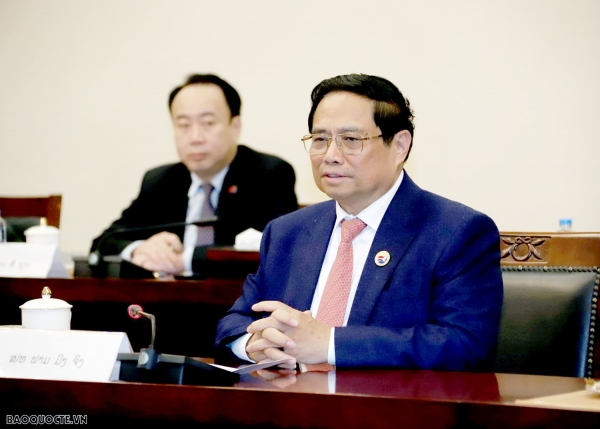 Prime Minister Pham Minh Chinh meets with Permanent Secretary of the Secretariat and Vice President of Laos Bounthong Chitmany