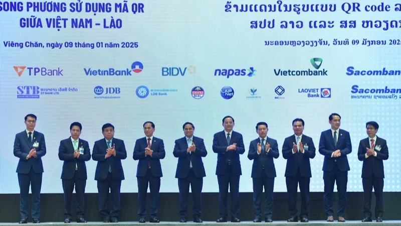 Annonce du cadre de paiement en monnaie locale et de la connexion bilatérale des paiements de détail à l'aide du code QR Vietnam-Laos