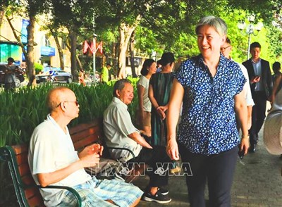 Australian Foreign Minister Penny Wong enjoys egg coffee and views of Hoan Kiem Lake