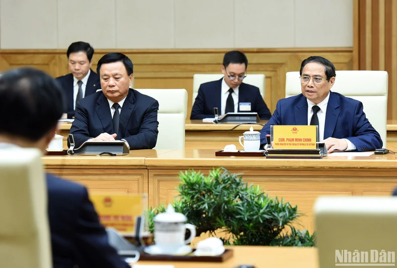 [Photo] Prime Minister Pham Minh Chinh receives Chairman of the Chinese People's Political Consultative Conference Wang Huning photo 4