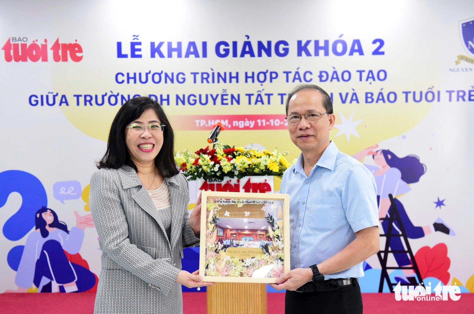 Khai giảng khóa 2 chương trình hợp tác đào tạo giữa báo Tuổi Trẻ và Trường đại học Nguyễn Tất Thành - Ảnh 1.