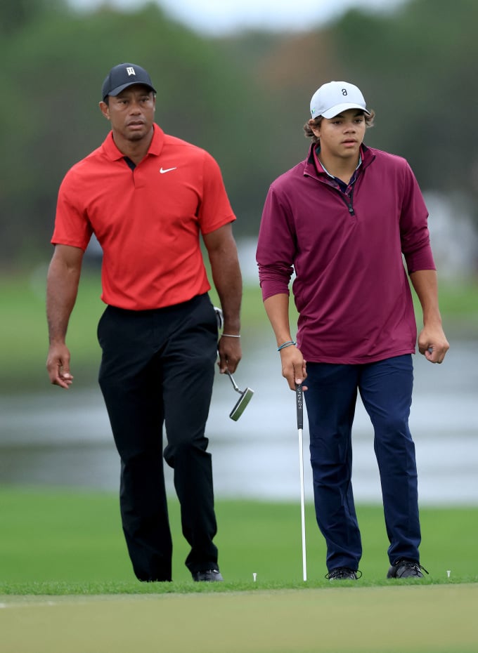 Tiger Woods in Nike gear and the old TW logo with his son Charlie Woods during the final round of the PNC Championship at The Ritz-Carlton, Orlando, USA on December 17. Photo: AFP