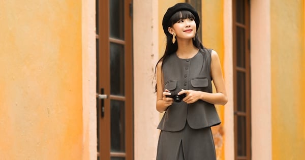 Office in autumn with vest, midi skirt and long dress