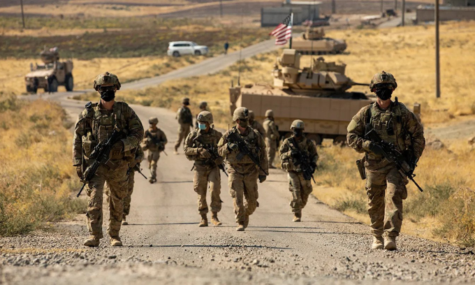 US soldiers patrol to protect an oil field in eastern Syria in November 2020. Photo: US Army