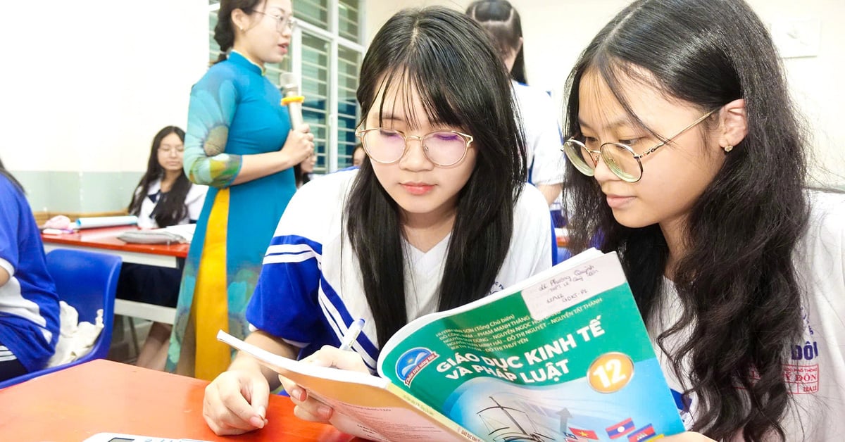 Are students temporarily residing in Ho Chi Minh City exempt from tuition fees?