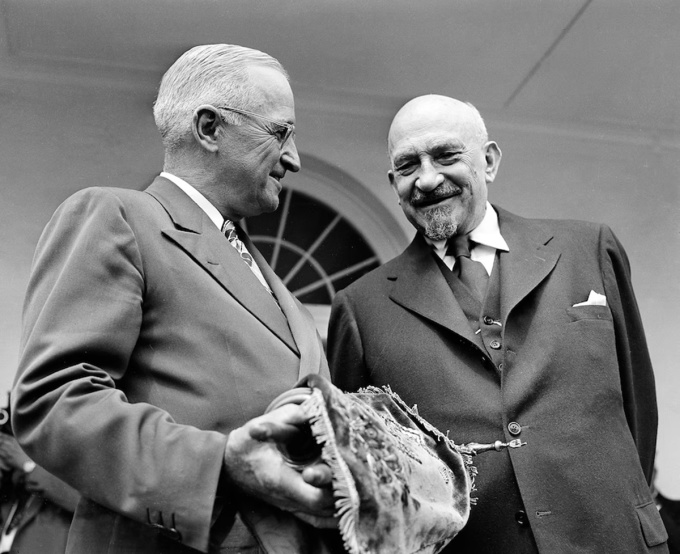 President Truman holds a copy of the Torah presented to him by Chaim Weizmann in Washington on May 25, 1948. Photo: AP