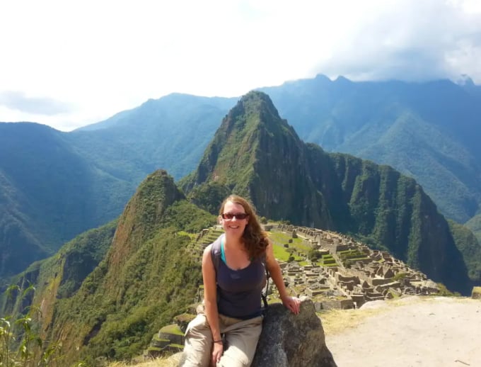 Claire takes a souvenir photo at Macchu Picchu. Photo: Insider