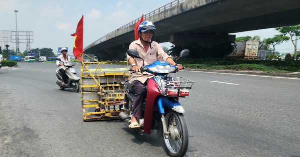 Chú xe ôm tăng số lần hút đinh trên đường góp sức cho mùa thi