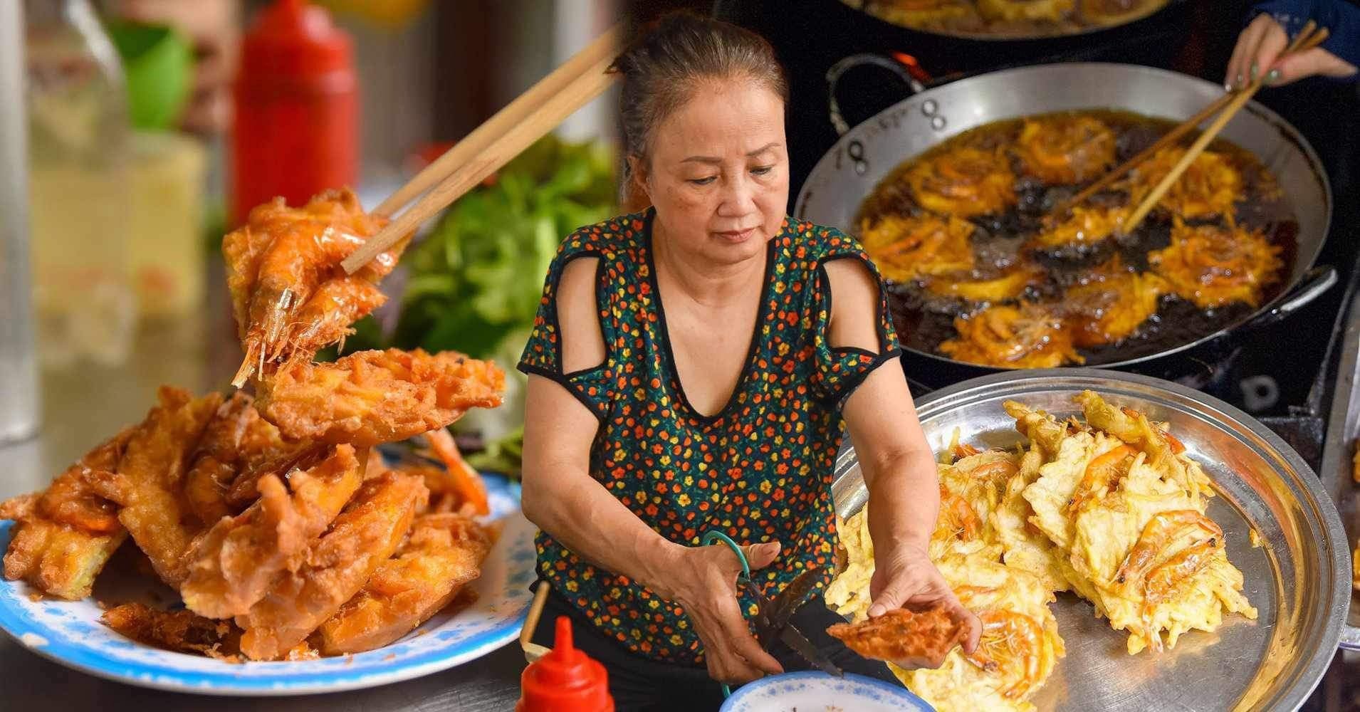 Mrs. Ams Garnelenkuchenladen verkauft 1.000 Stück pro Tag in der Dong Xuan Marktgasse in Hanoi