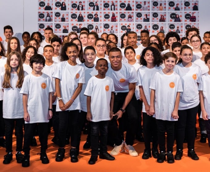 Mbappe at the launch of a children's academy funded by his foundation. Photo: Inspired by KM