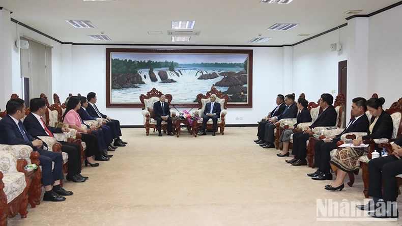 Vietnam, Laos strengthen cooperation between the two Propaganda and Education agencies photo 1