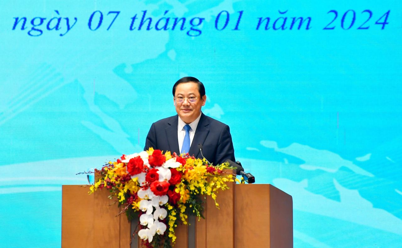 Lao Prime Minister Sonexay Siphandone speaks at the conference. Photo: Hai Nguyen