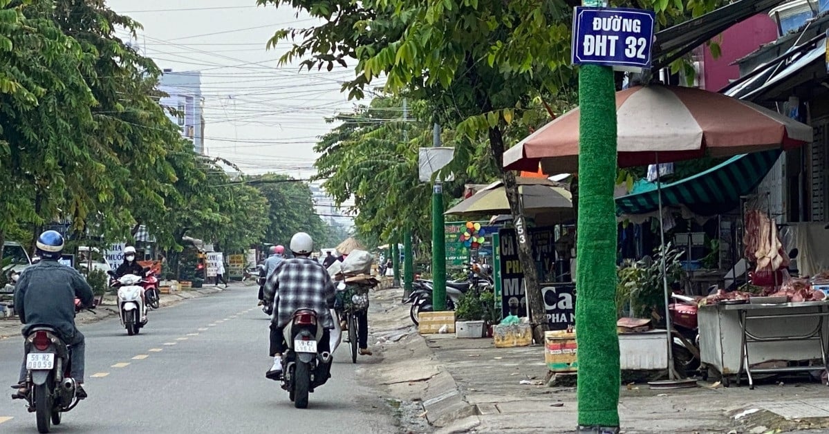 Still wrapping plastic grass to 'green' hundreds of electric poles