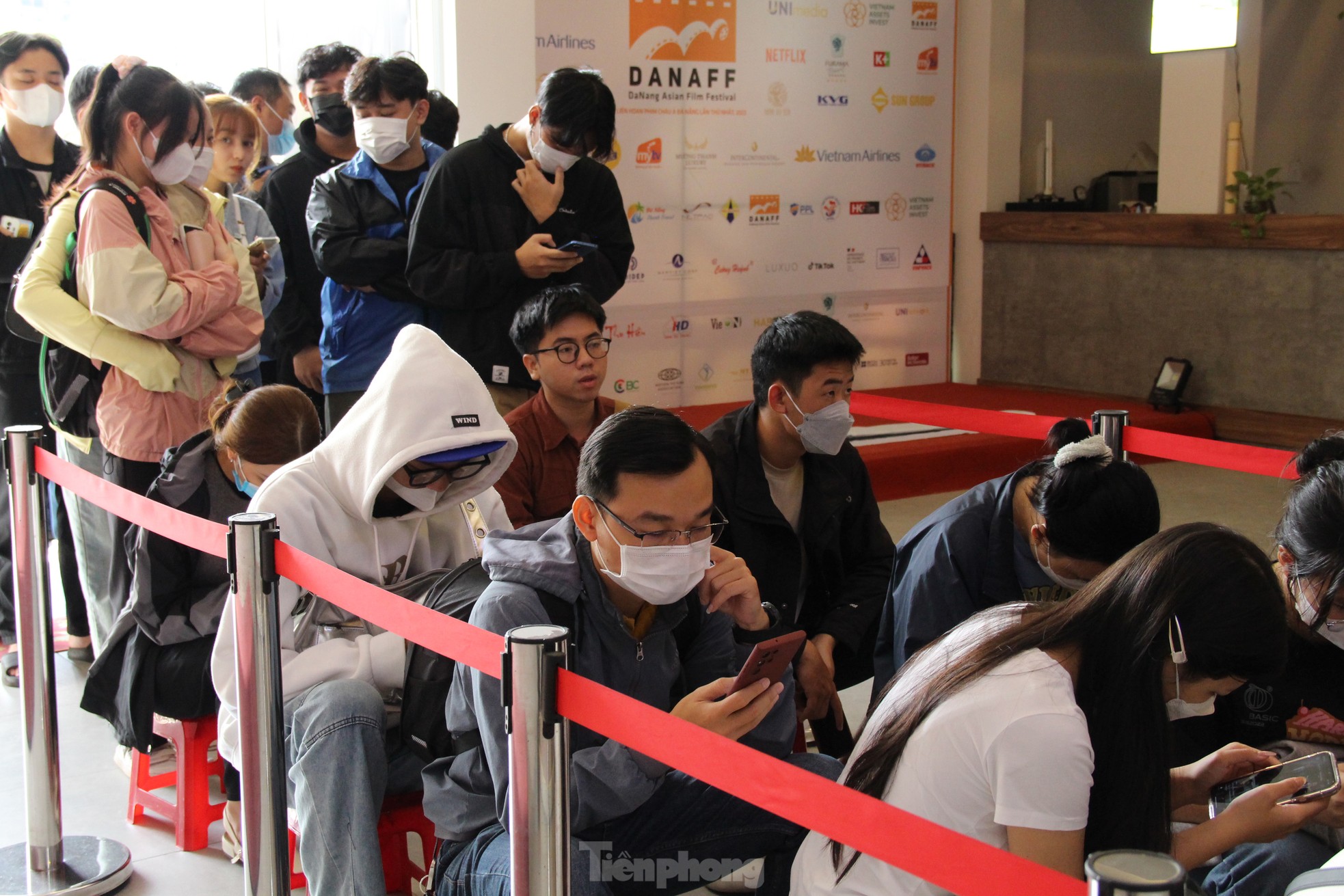 Young people lined up in the sun to buy tickets to see 'Peach, Pho and Piano' photo 14