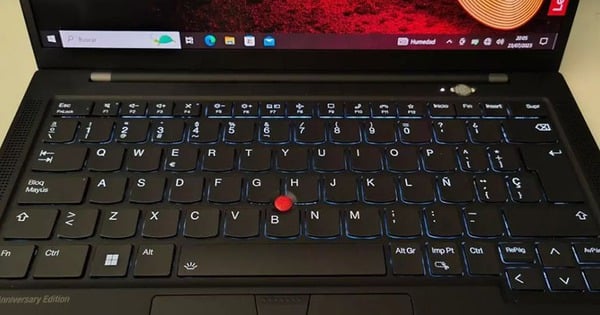 Why do some laptops have a 'red button' in the middle of the keyboard?