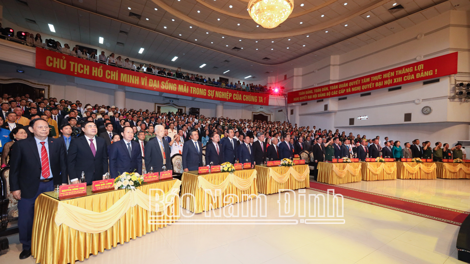 Delegates perform the flag salute ceremony.