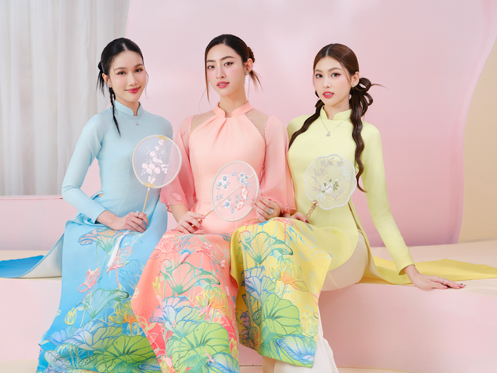 Miss Luong Thuy Linh, die Zweitplatzierte Phuong Anh und die Zweitplatzierte Ngoc Thao sind anmutig und charmant in Ao Dai-Designs von Le Ngoc Lam.