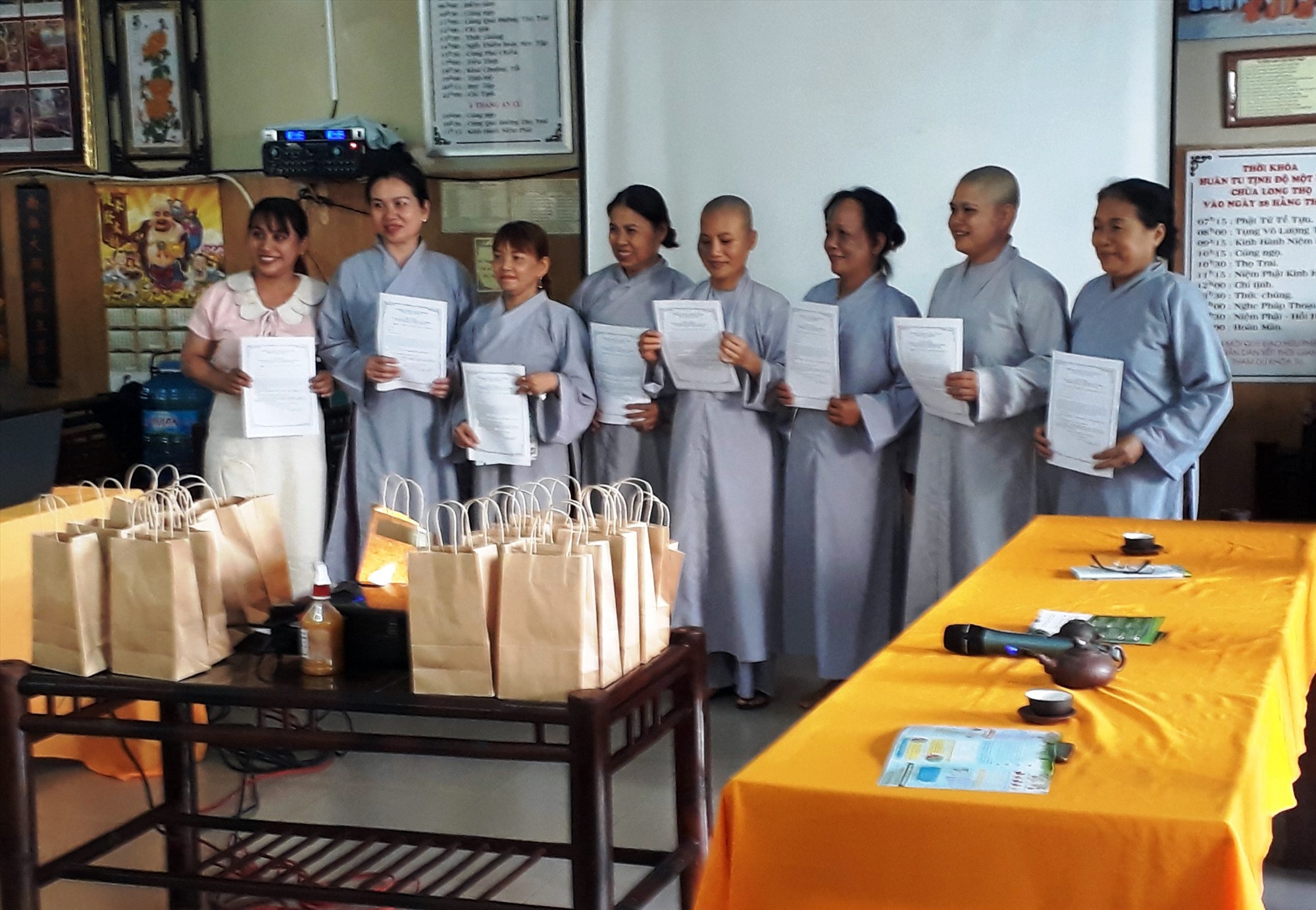 Presenting Commitment Forms to Buddhist monks and nuns who registered to participate in the 3R model.