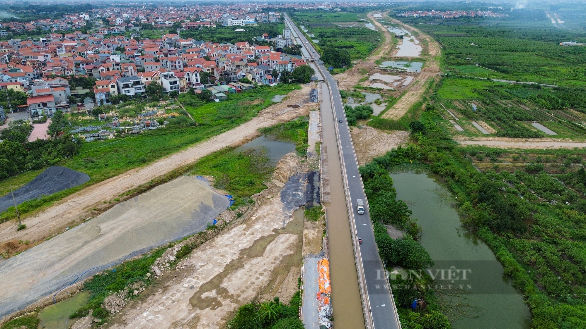 Hình hài đường Vành Đai 4 đi qua 7 quận, huyện Hà Nội sau hơn 1 năm khởi công - Ảnh 9.