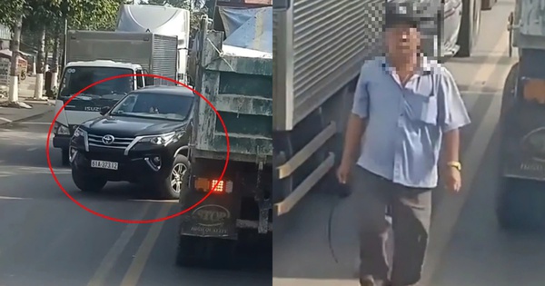 A man in Binh Duong drove the wrong way and threatened to beat the truck driver.