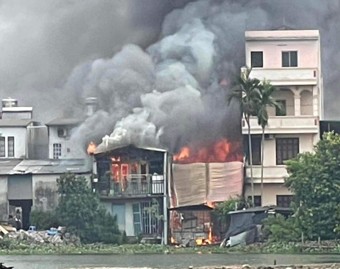 The wood workshop caught fire and then spread to the house next door. Photo: Contributor