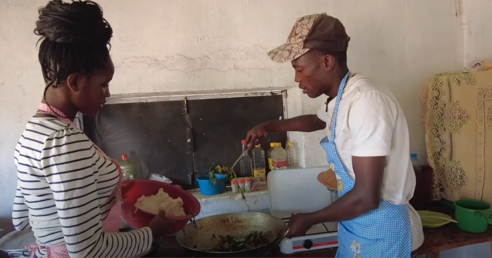 African guy sells delicious and unique Vietnamese food, customers bring buckets and basins to buy