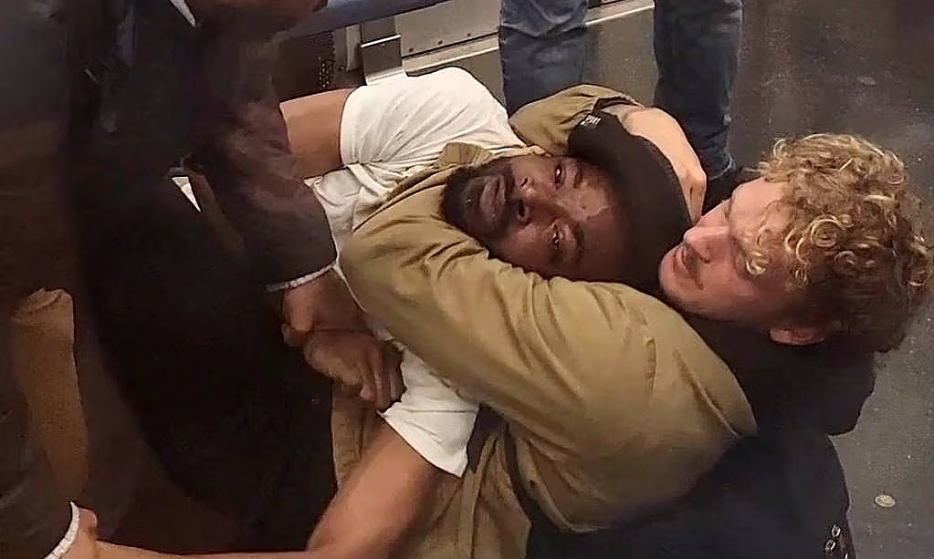 Veteran charged with manslaughter after choking black man