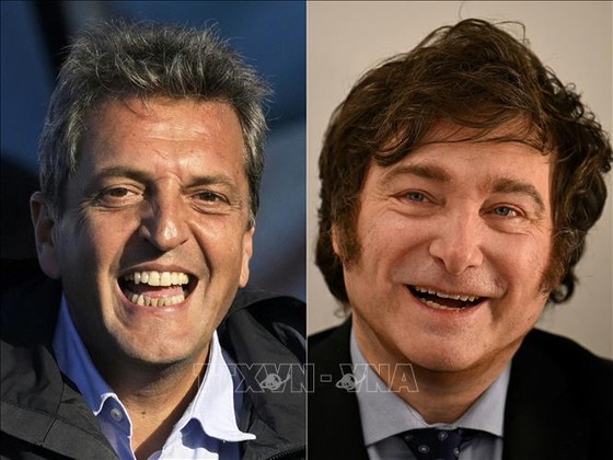 Los candidatos presidenciales argentinos Sergio Massa (izquierda) y Javier Milei (derecha). Foto: AFP/VNA
