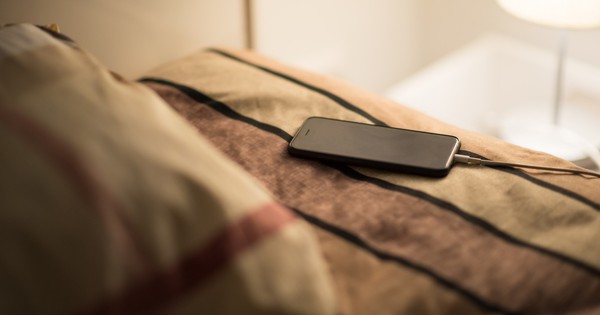 Why shouldn't you put your phone right next to your bed when you sleep?