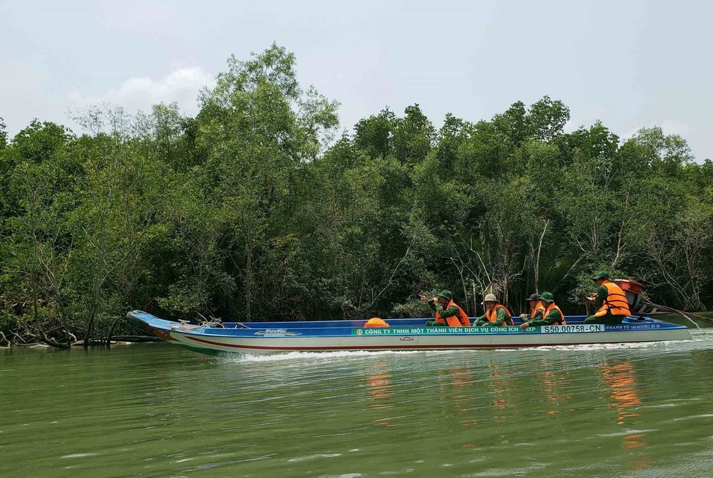 Ho Chi Minh City Youth Union patrols to protect Can Gio mangrove forest. (Photo: Xuan Du/VNA)