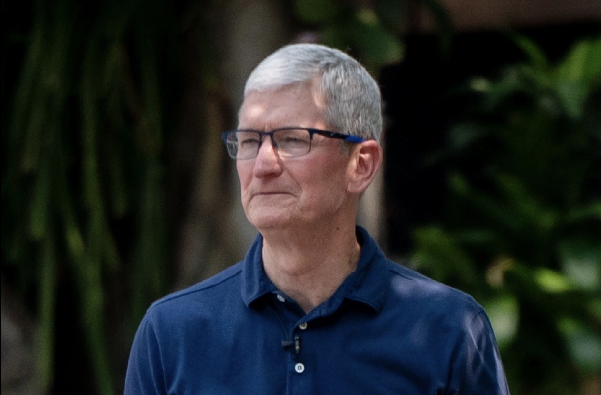 Apple CEO Tim Cook attends a class of Hanoi students