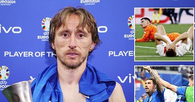 Khuôn mặt đau khổ của Luka Modric khi nhận giải cá nhân