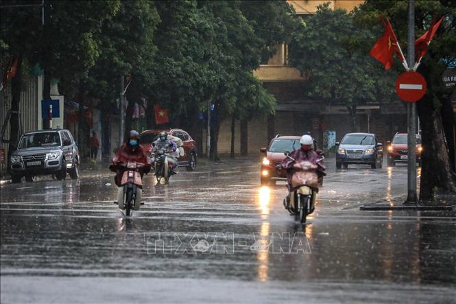 ハノイ市は曇り空で、日中は散発的に雨が降り、夜間は一部地域で雨が降る見込みです。イラスト写真：VNA