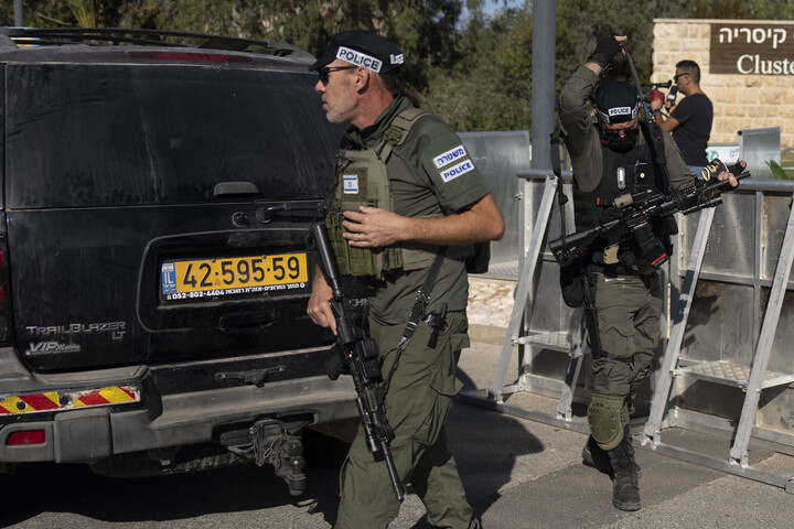 Israeli security forces guard a road near Prime Minister Benjamin Netanyahu's home after a drone attack on October 19. (Photo: AP)