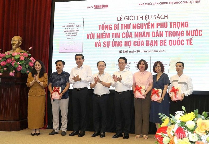 Presenting symbolic books to representatives of some agencies, localities, units, schools, and libraries  